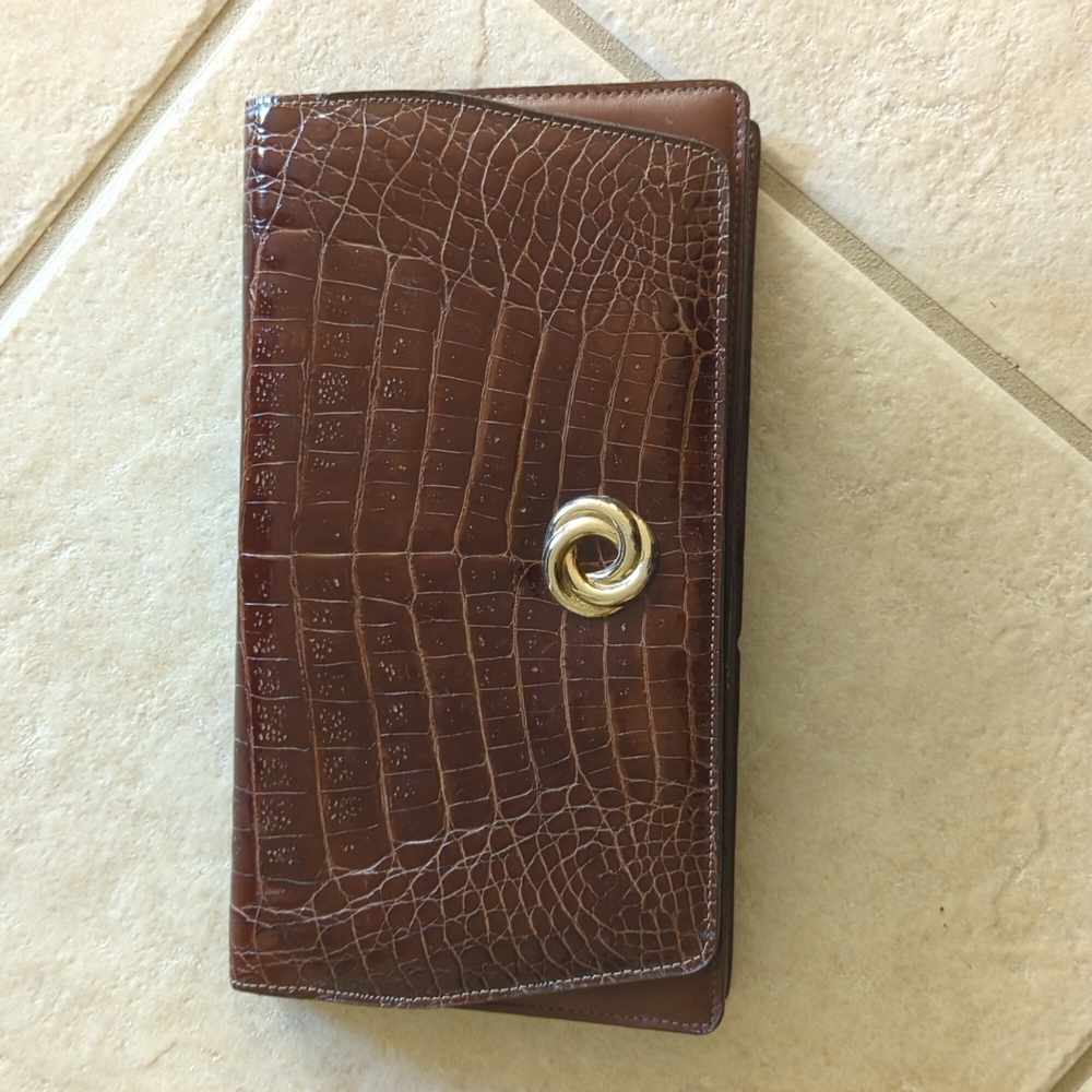 Vintage brown leather clutch with shoulder strap